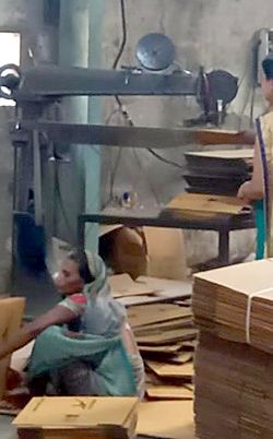 Boxes being stitched